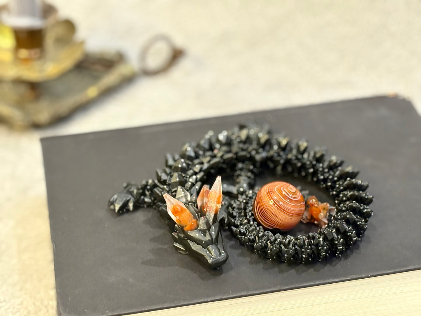 Black Resin Dragon with Red Jasper Horns and Tail